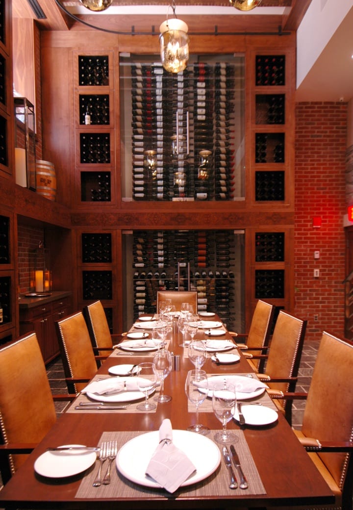A large dining table designed setting designed by Young Caruso